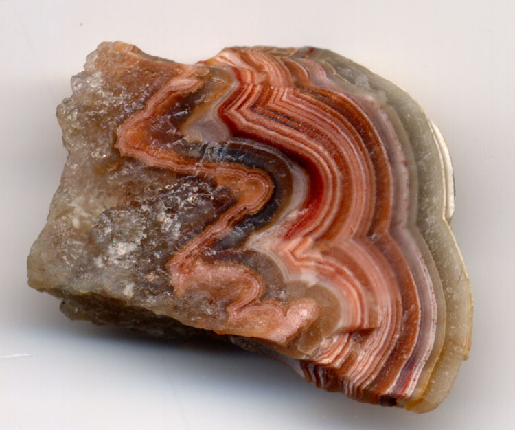 Banded agate with curved layers visible across its exposed face